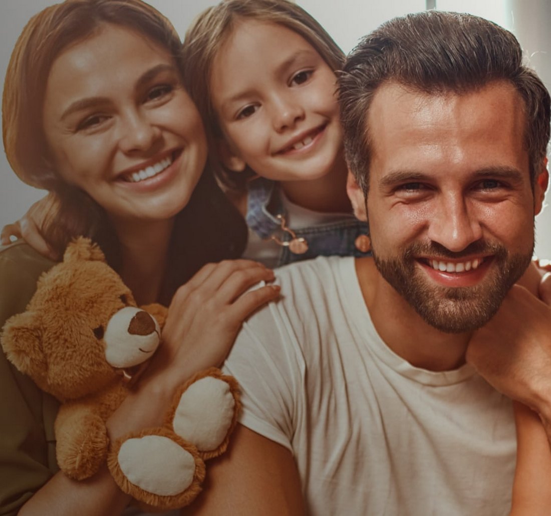 Happy family happily smiling at Las Vegas Dentist